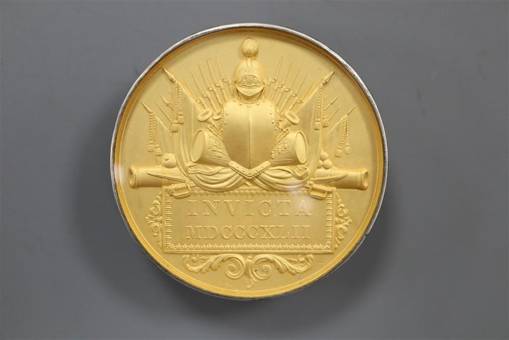 A medal for the Defense of Kelat-I-Ghilzie; gilt and glass cased